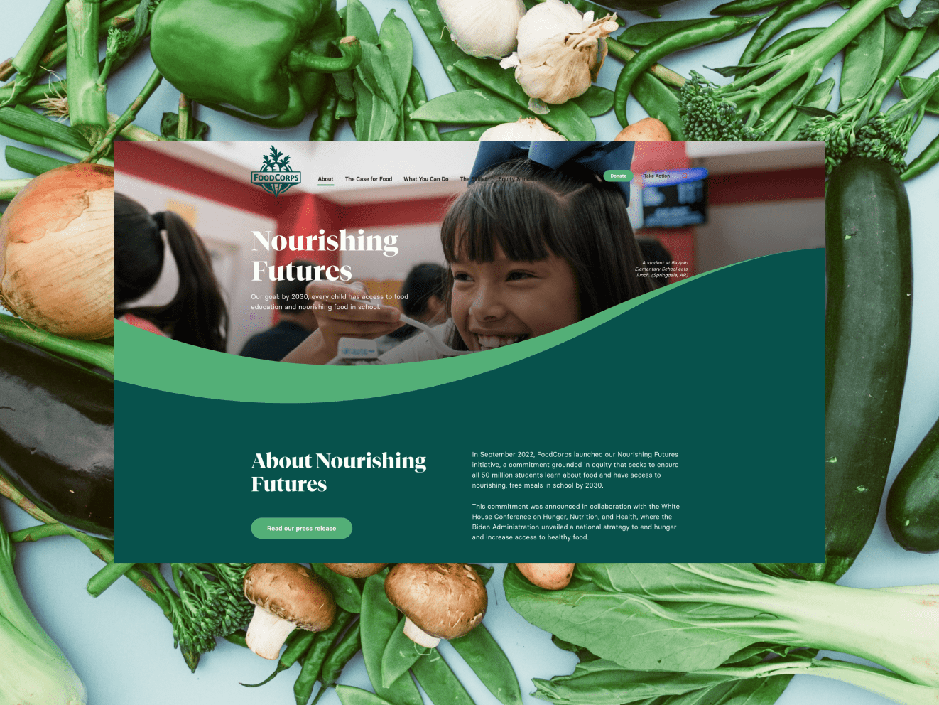 The Foodcorp website homepage with the words "Nourishing Futures" and an array of aesthetically arranged vegetables in the background.